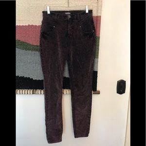 Purple velvet high waisted skinny jeans.